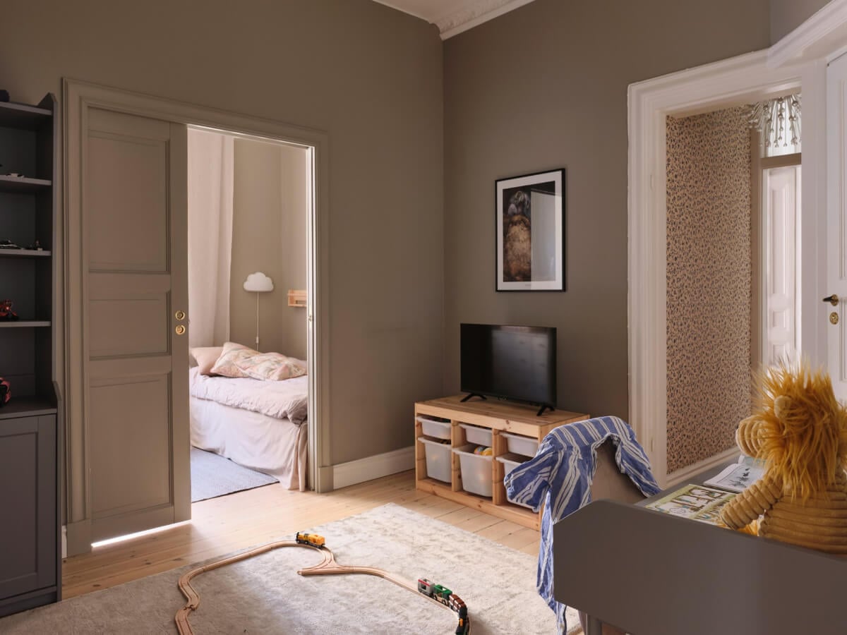 A Spacious Turn-of-the-Century Apartment with Nice Color Accents 26 play room
