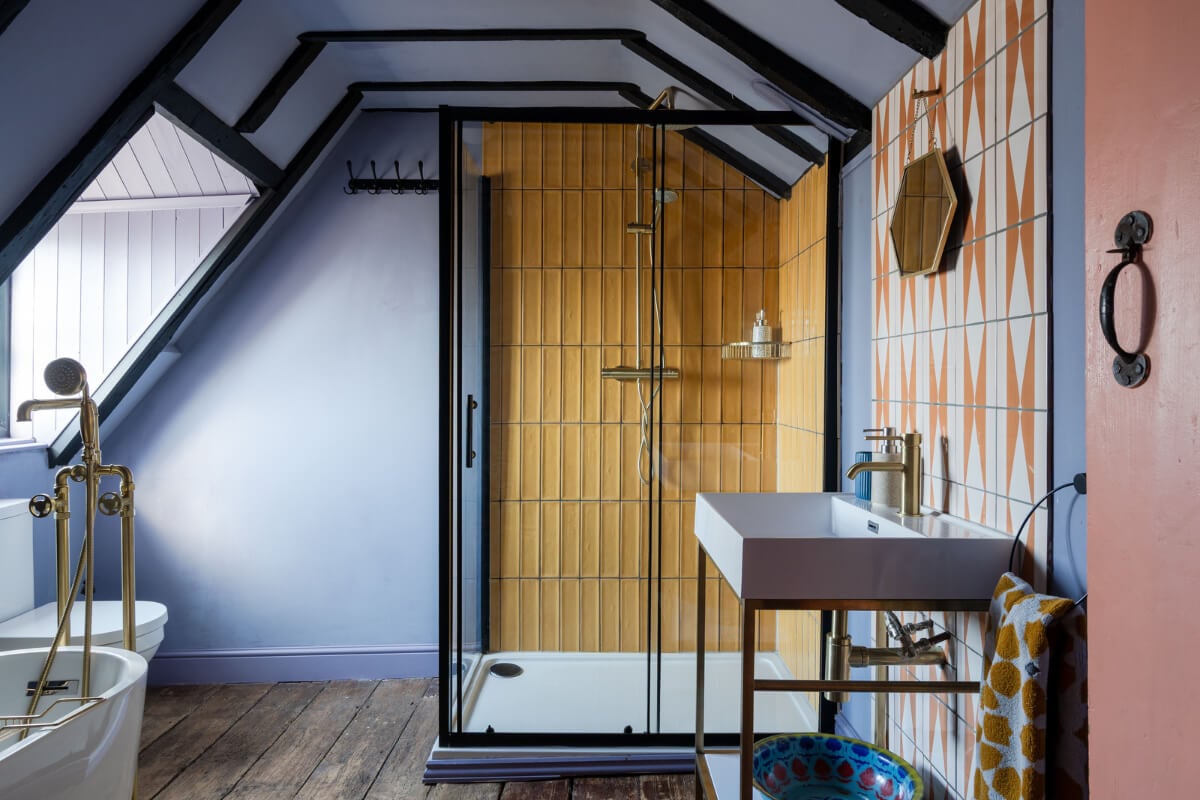 Colorful Design and Historic Features in a Charming English Home 21 purple walls yellow tiles and rustic floorboards in bathroom nordroom