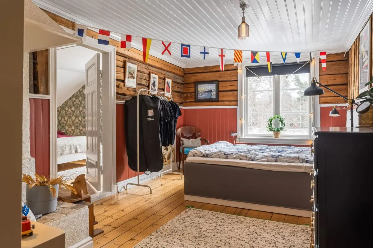 A Cozy Country House in Sweden Filled with Wallpapers 26 rustic bedroom double wooden doors