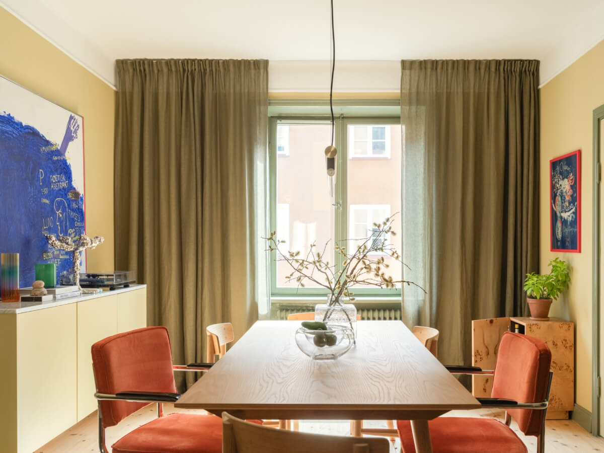 A Yellow and Green Color Palette in a Modern Swedish Apartment 10 scandi dining room
