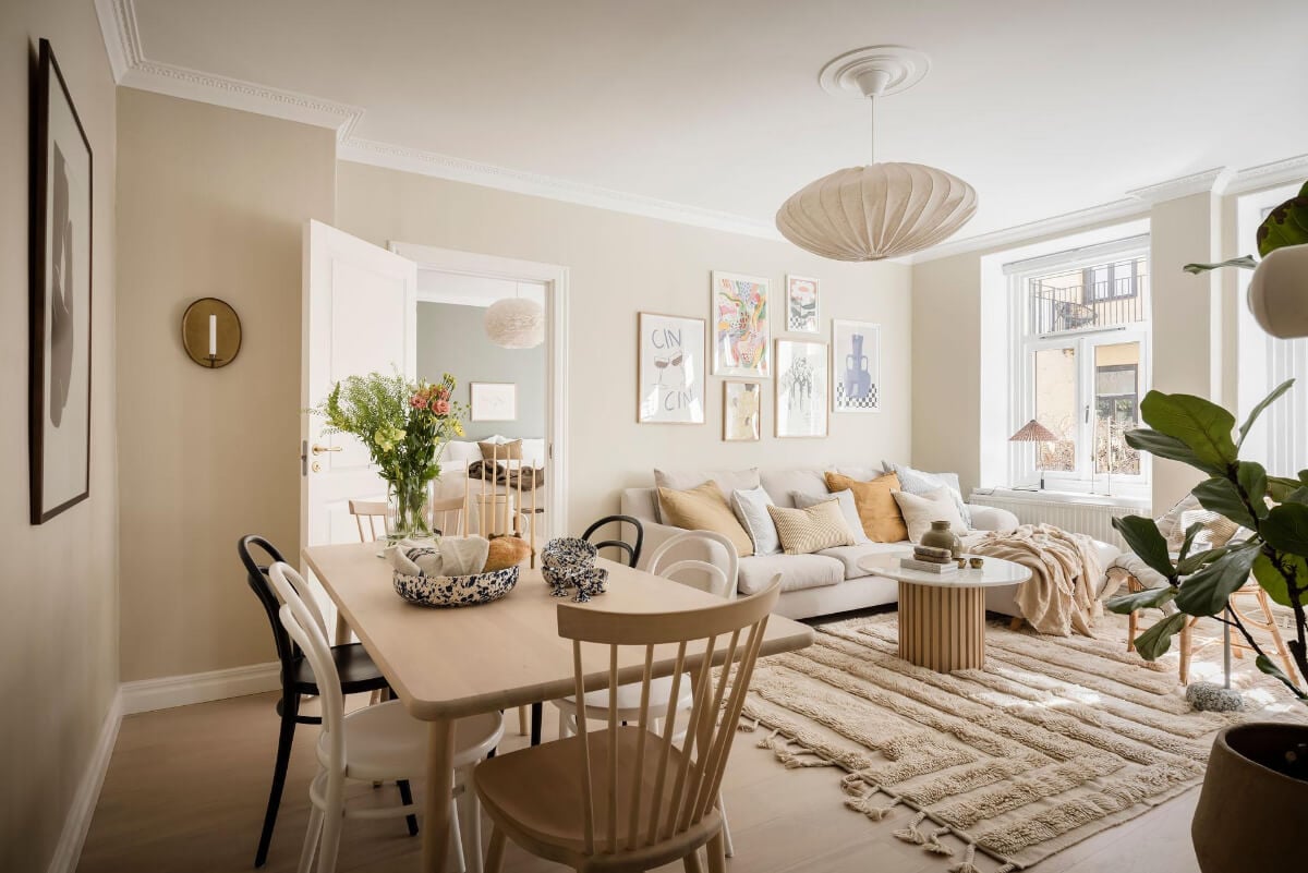 A Bright One-Bedroom Apartment with a Large Balcony 3 scandi living room beige walls dining table
