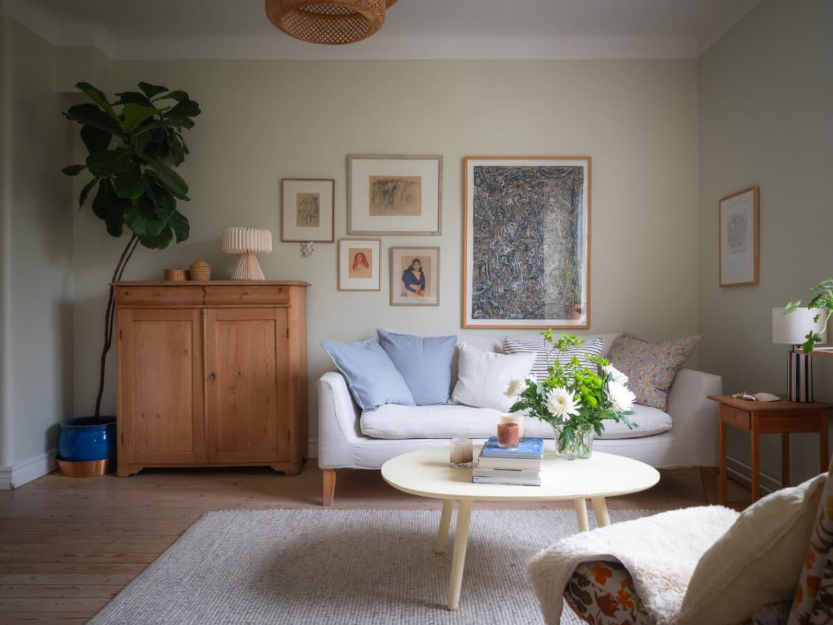 A Soft Color Palette and a Charming Kitchen in a Swedish Apartment 12 scandi living room light green walls