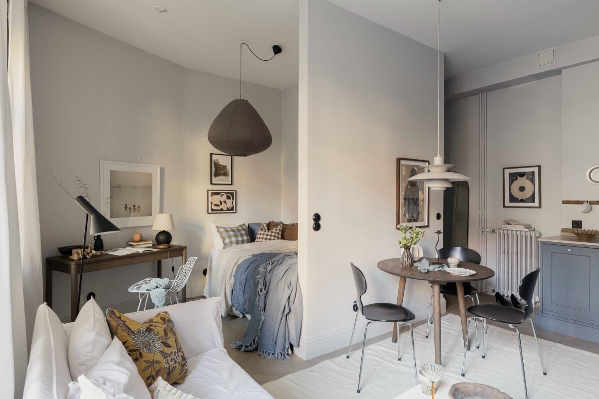 A Stylish Swedish Studio Apartment with a Blue Kitchen 14 scandi studio apartment light gray walls