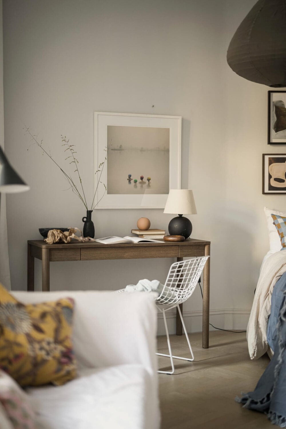 A Stylish Swedish Studio Apartment with a Blue Kitchen 17 scandi studio wooden desk