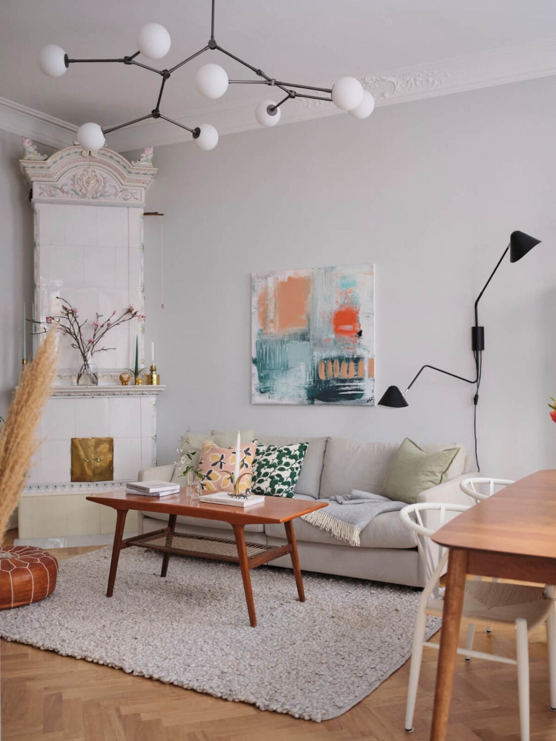 Classic Elements and Light Rooms in a Lovely Family Apartment 2 scandinavian living room fireplace