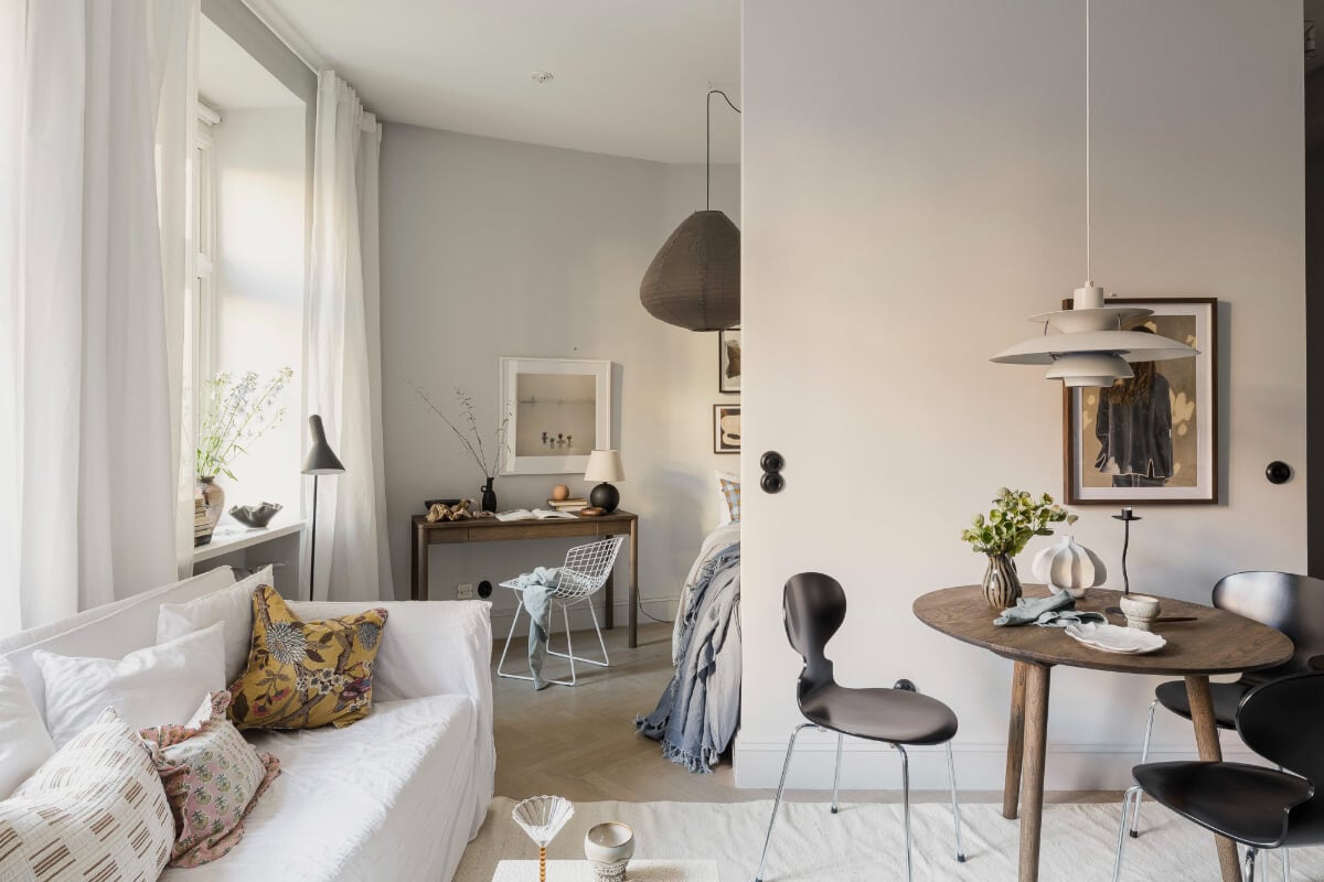 A Stylish Swedish Studio Apartment with a Blue Kitchen 13 scandinavian studio apartment bed niche