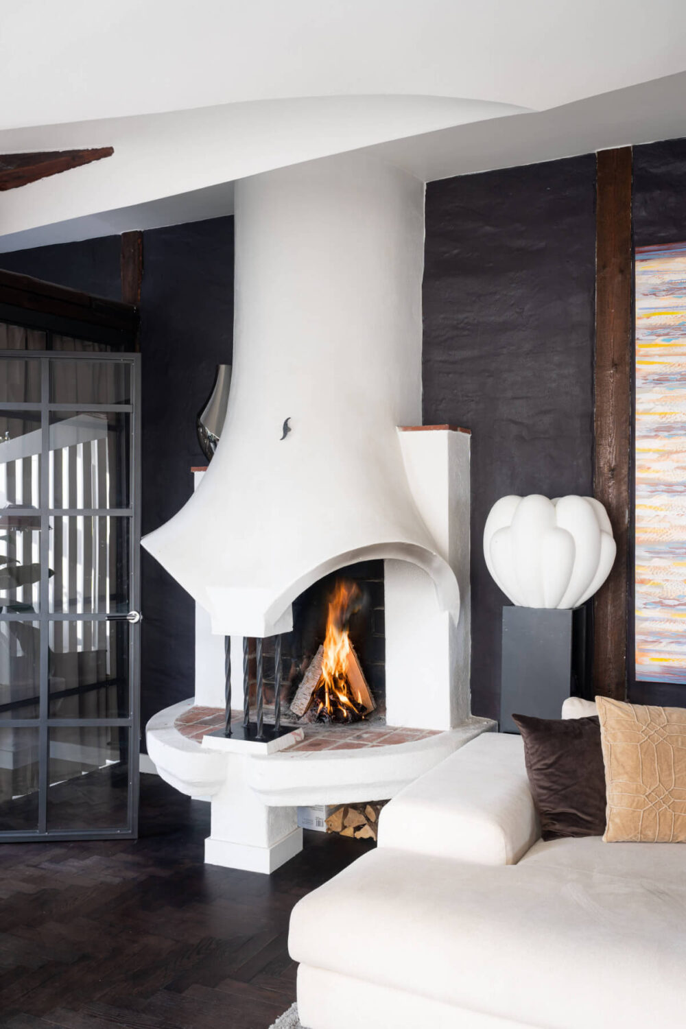 A Stylish Black and White Penthouse Apartment in Stockholm 6 sculptural white fireplace