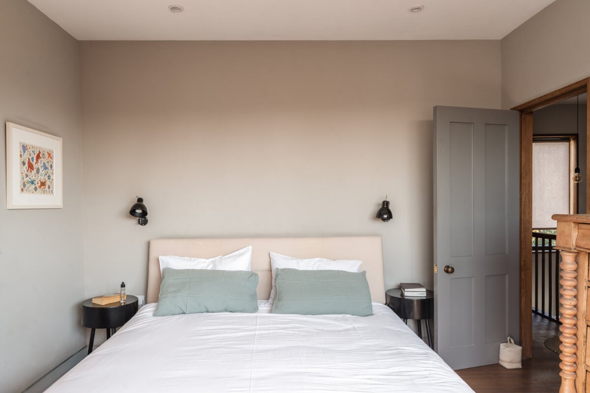 An Edwardian House with Muted Tones, Natural Materials, and a Landscaped Garden 22 serene bedroom