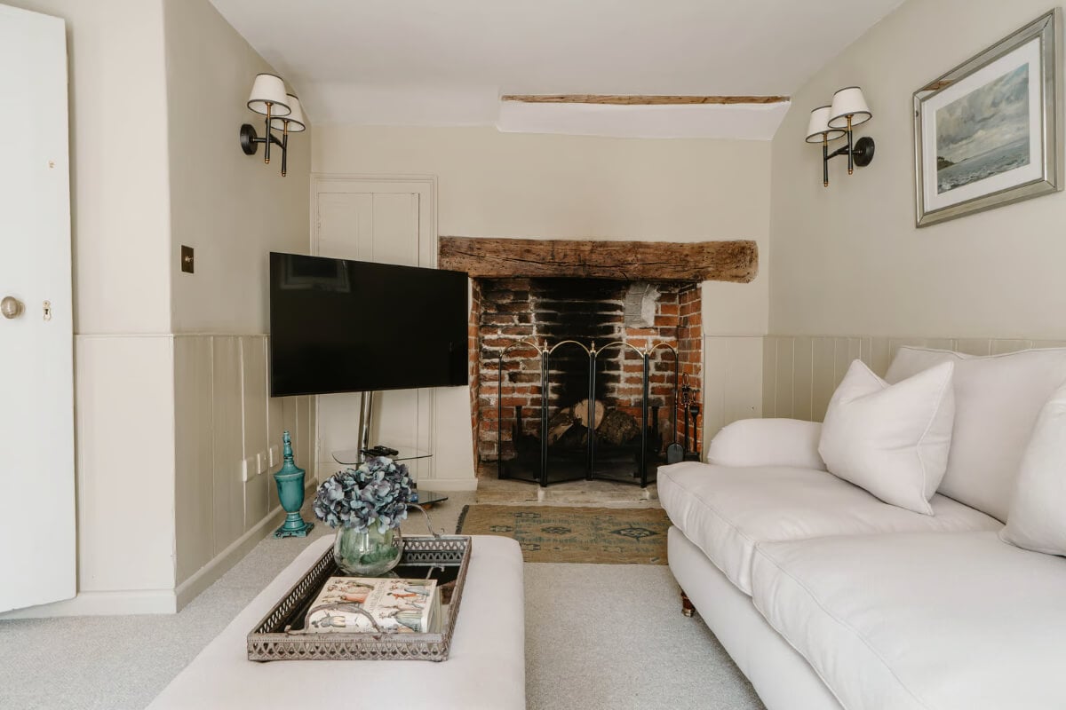 Serene Colors and Historic Elements in an Elizabethan Home in Wiltshire 6 serene living room brick fireplace
