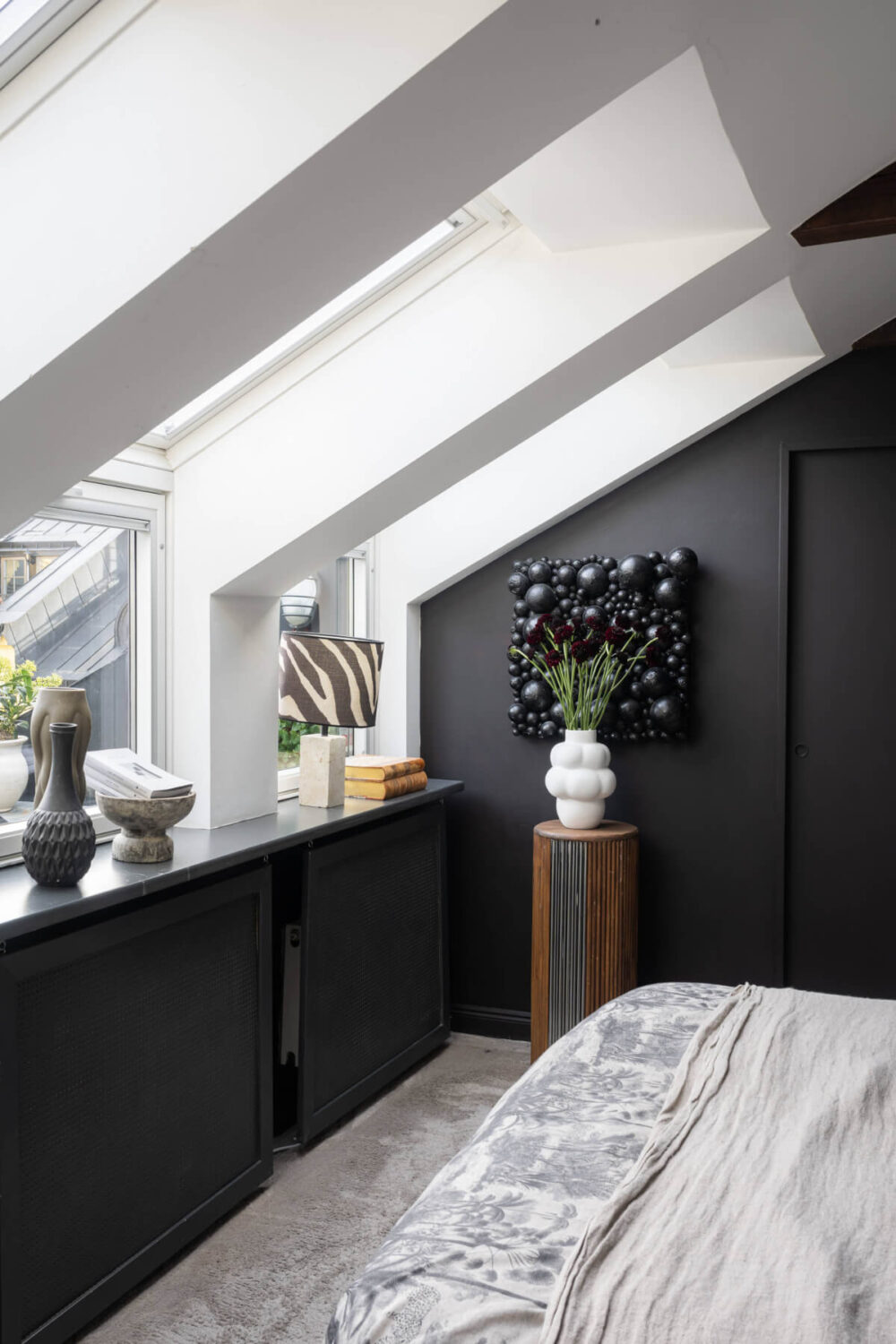 A Stylish Black and White Penthouse Apartment in Stockholm 13 skylights attic bedroom stockholm penthouse