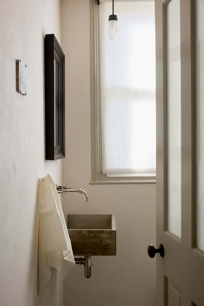 Bespoke Oak Cabinets and Plaster Walls in a London Garden Apartment 20 small bathroom concrete sink