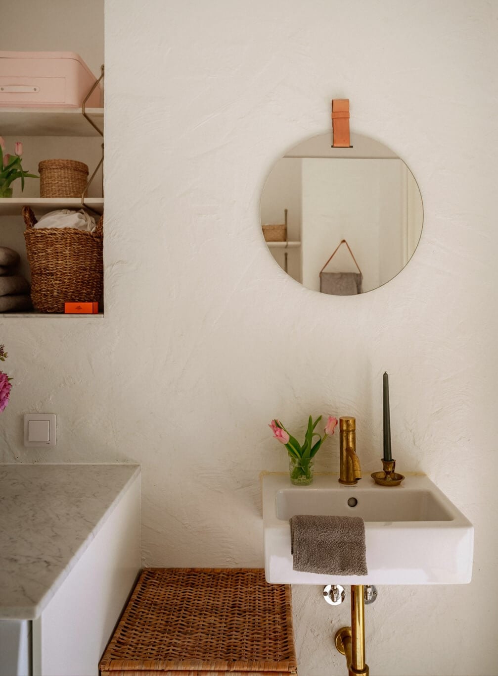 A Bright Attic Apartment with Exposed Beams and a Roof Terrace 22 small bathroom sink round mirror