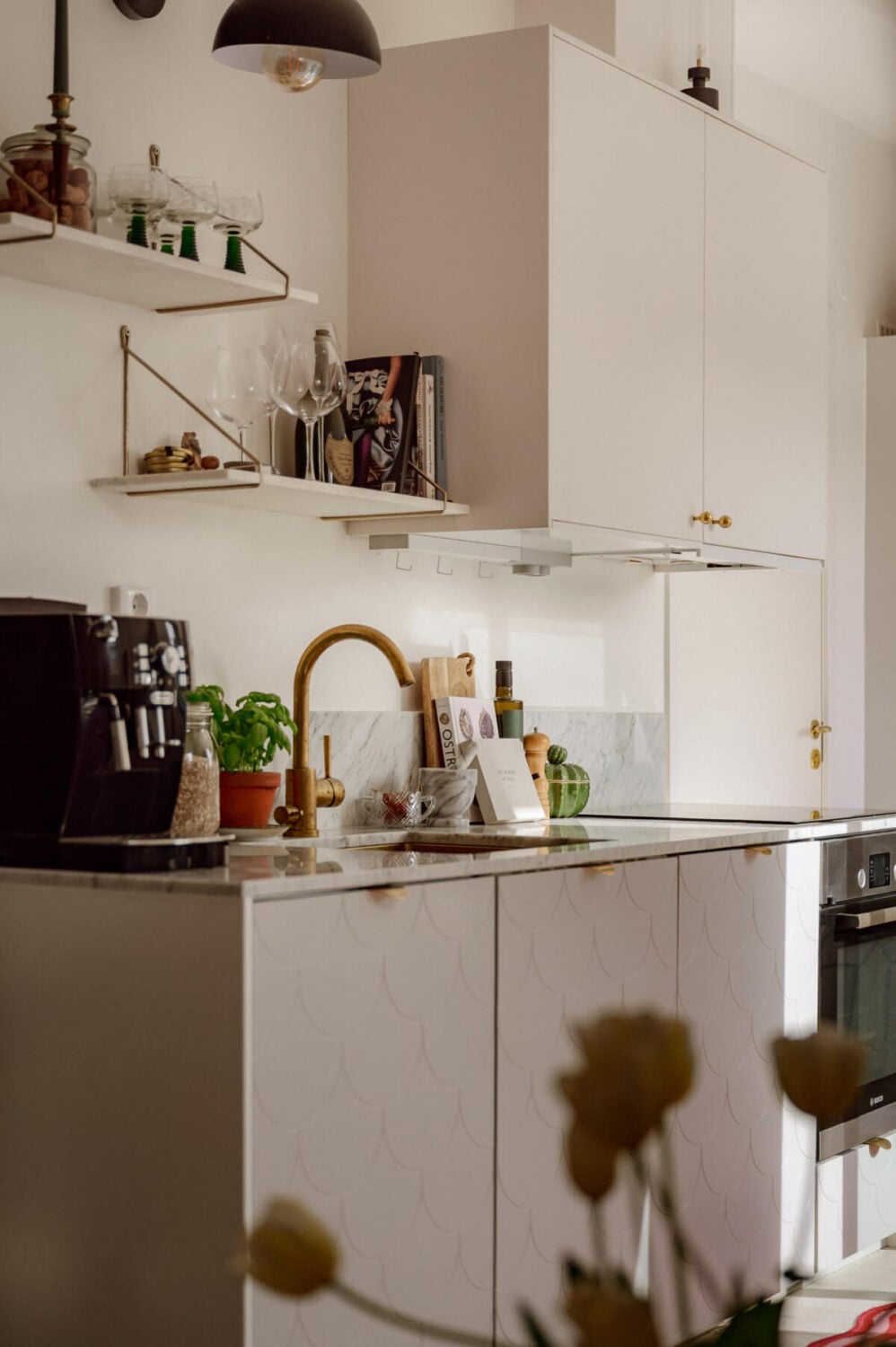 A Bright Attic Apartment with Exposed Beams and a Roof Terrace 6 small kitchen brass fittings