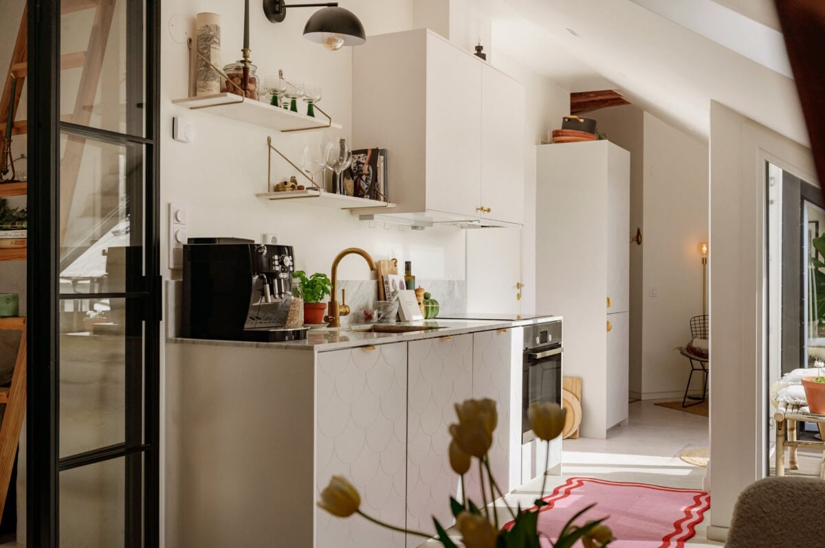 A Bright Attic Apartment with Exposed Beams and a Roof Terrace 8 small kitchen shelves brass fittings
