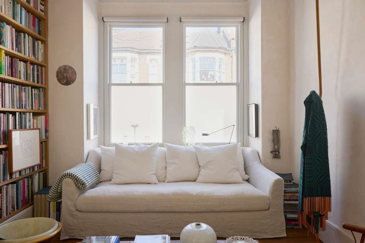 Bespoke Oak Cabinets and Plaster Walls in a London Garden Apartment 2 small living room floor-to-ceiling bookshelves