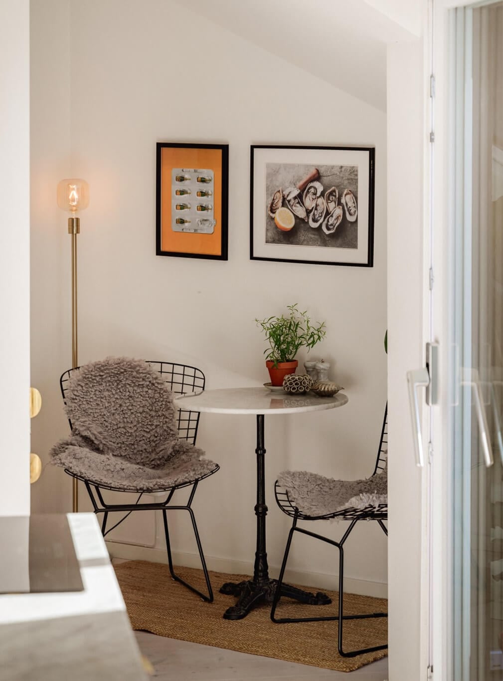 A Bright Attic Apartment with Exposed Beams and a Roof Terrace 20 small round table