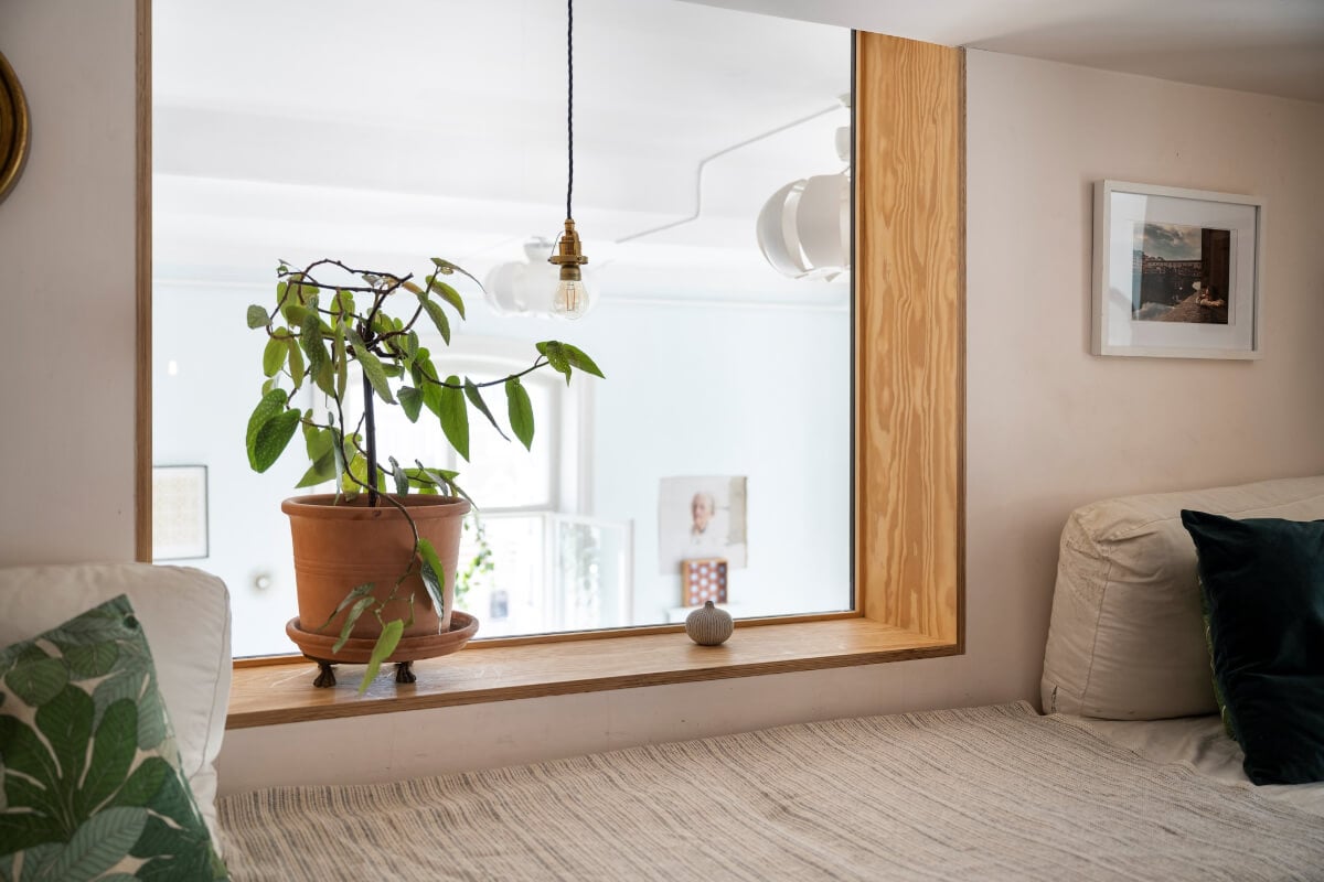 Pale Blue Walls and Huge Windows in a Swedish Loft Apartment 23 snug inner window