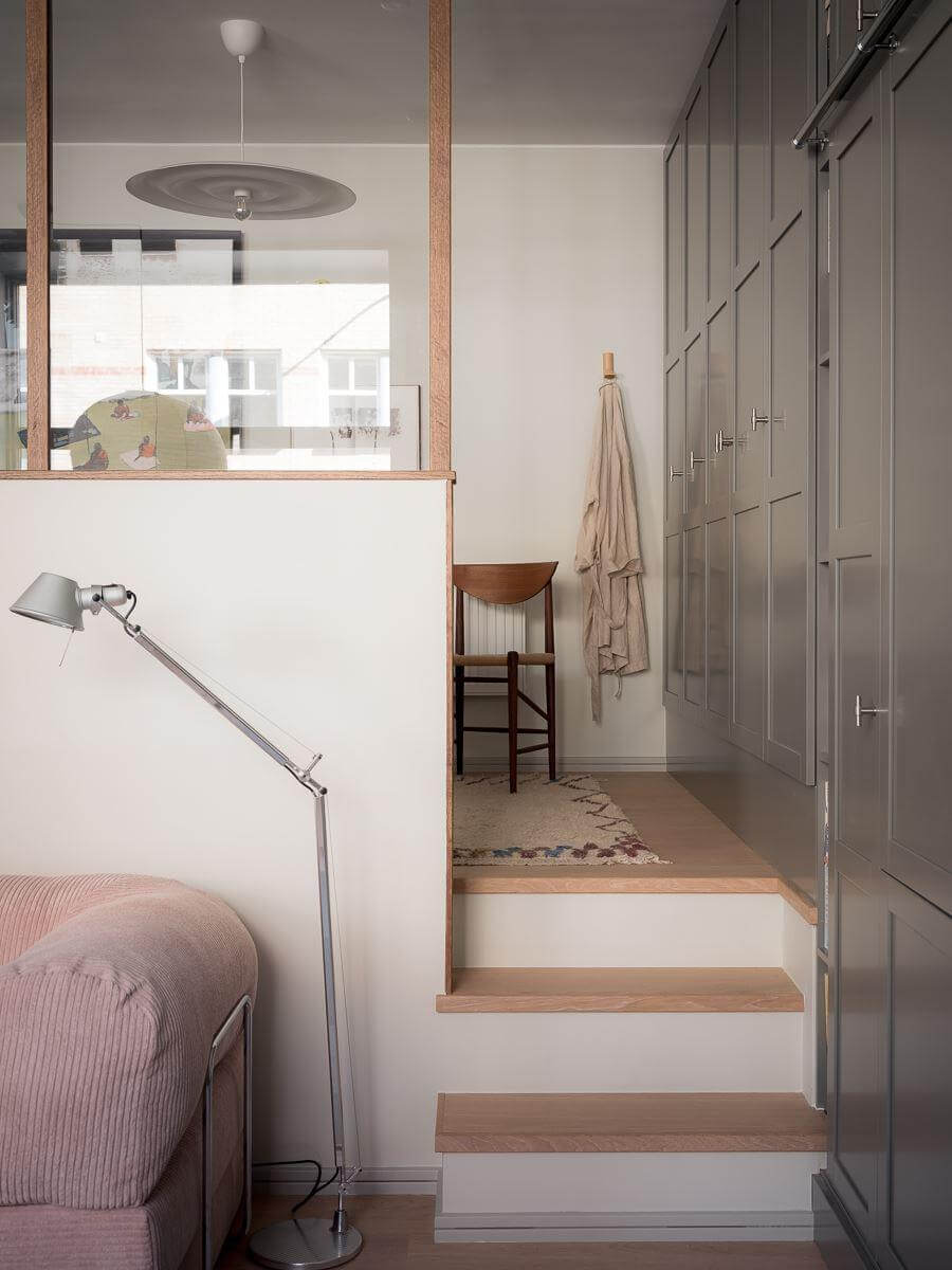 A Modern Split-Level Apartment in a Former Bakery 16 split-level apartment bedroom with built-in wardrobes