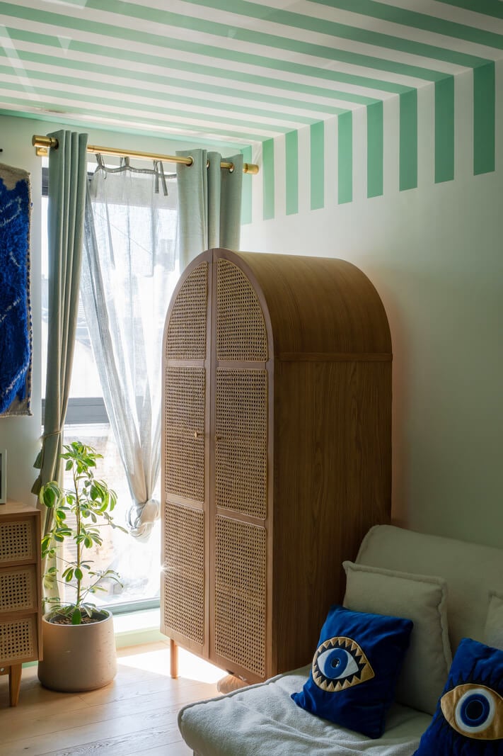 Arched Shapes and Hand-Painted Murals in a Joyful London Townhouse 18 striped green and white ceiling