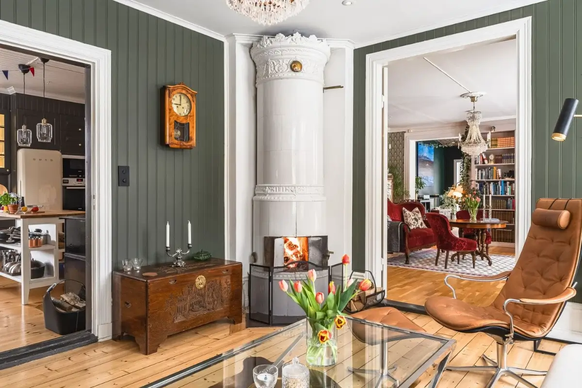 A Cozy Country House in Sweden Filled with Wallpapers 13 swedish fireplace
