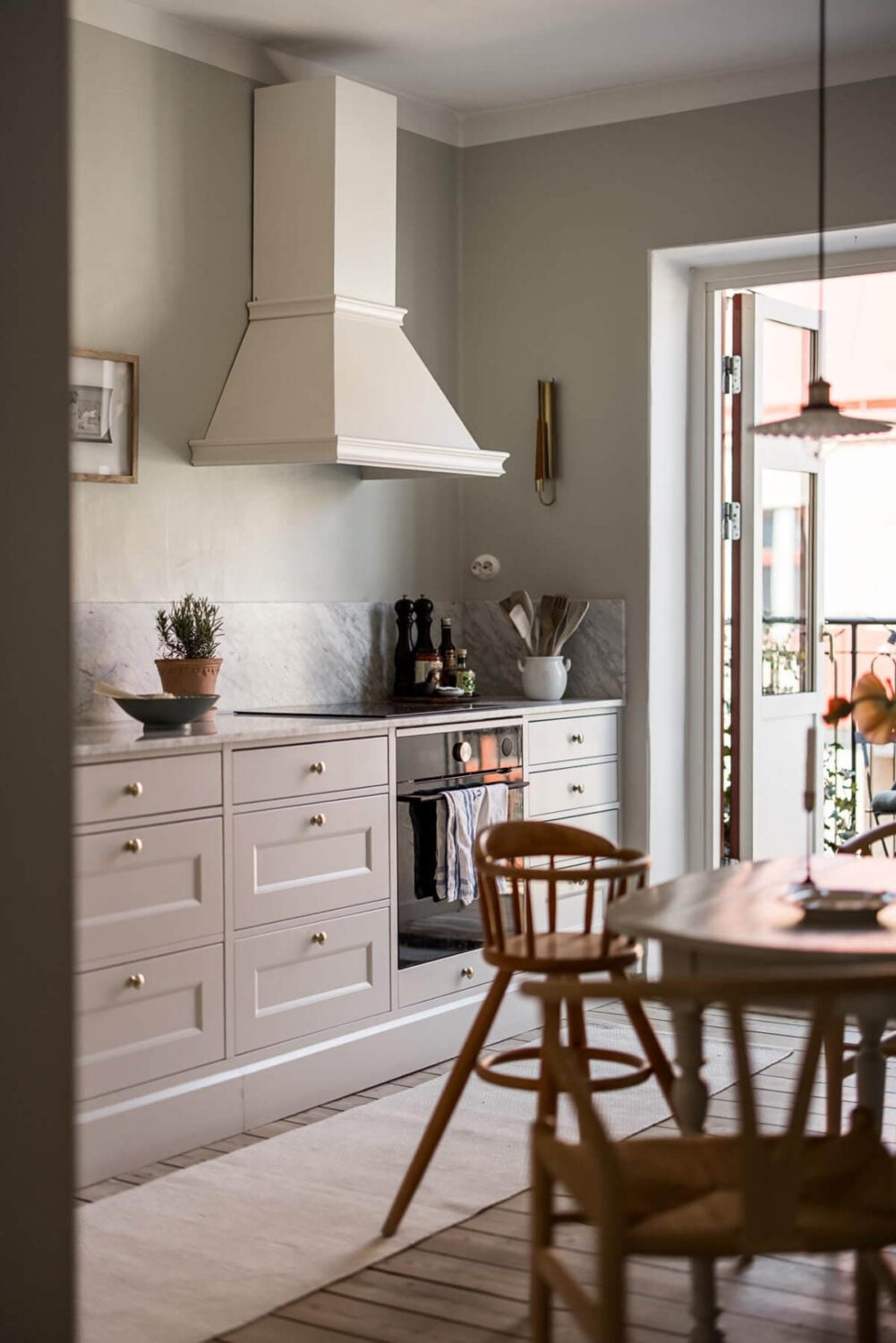 Gray Tones and a Classic Kitchen in a Swedish Apartment 15 view into kitchen