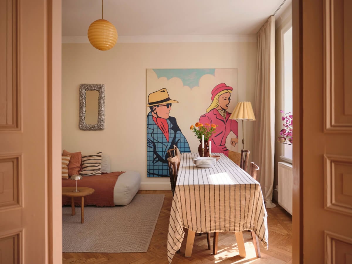 Warm, Natural Light in a Renovated Turn-of-the-Century Apartment 4 view into living room large art