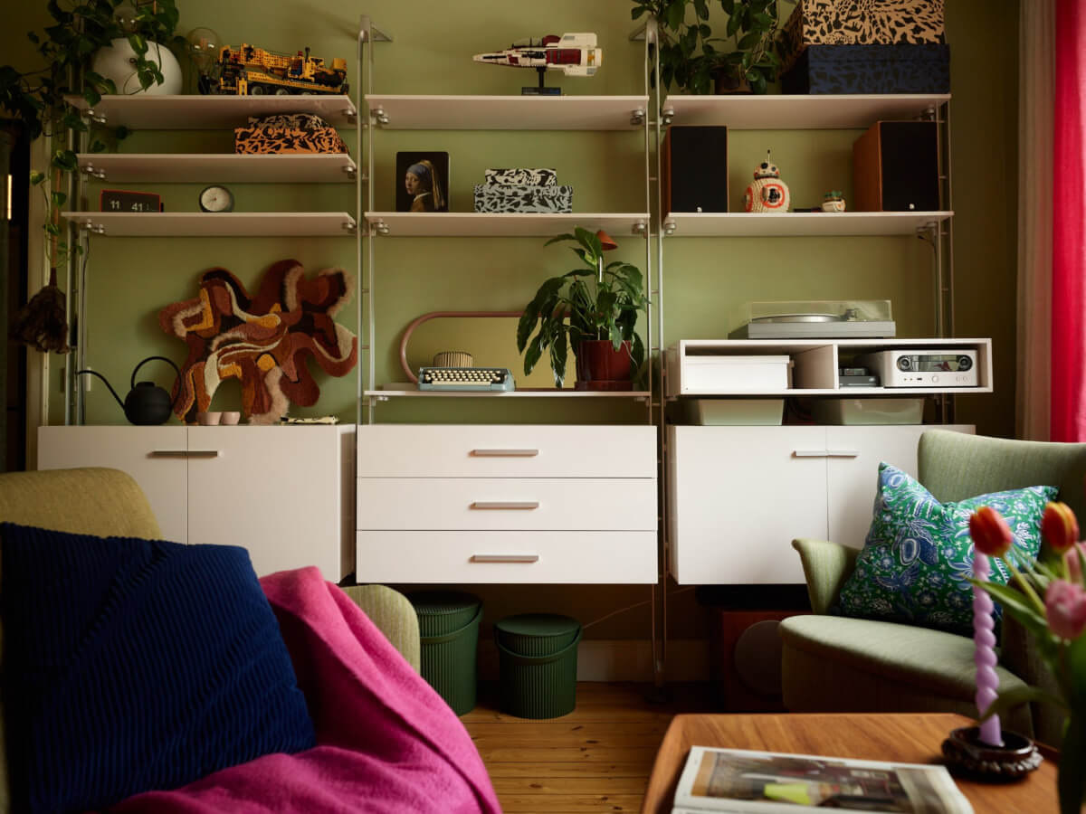 A Colorful Studio Apartment with Smart Storage and A Cozy Bed Niche 4 wall-mounted shelves cabinets studio apartment