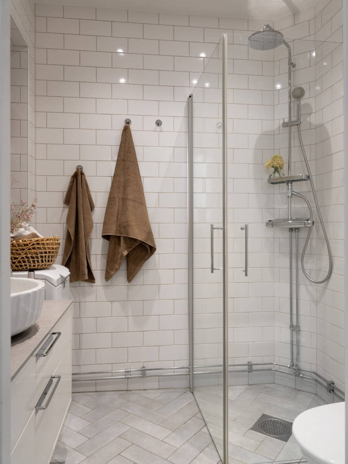 A Small Apartment with Green Color Accents and a Cozy Patio Terrace 23 white bathroom