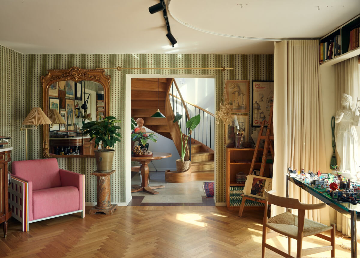 A Personal and Cozy 1960s Family Home in Sweden 24 wide open doorway living space herringbone floor