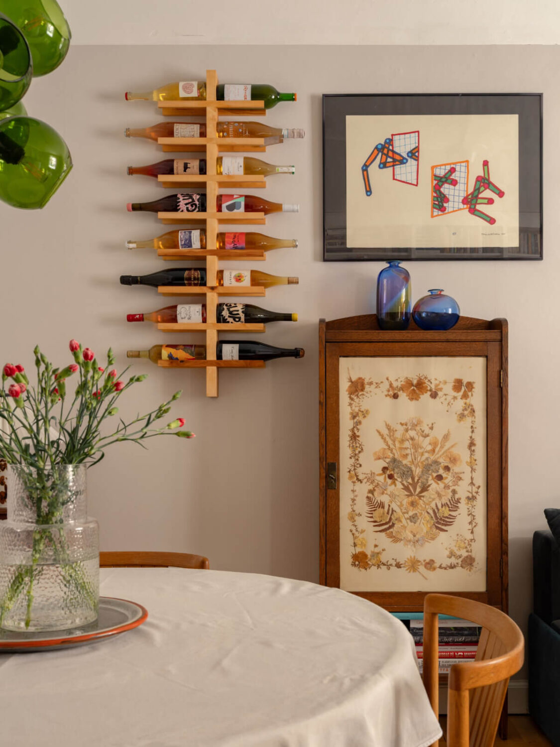 A Small, Cozy Apartment with Built-in Storage and Bookshelves 9 wine storage