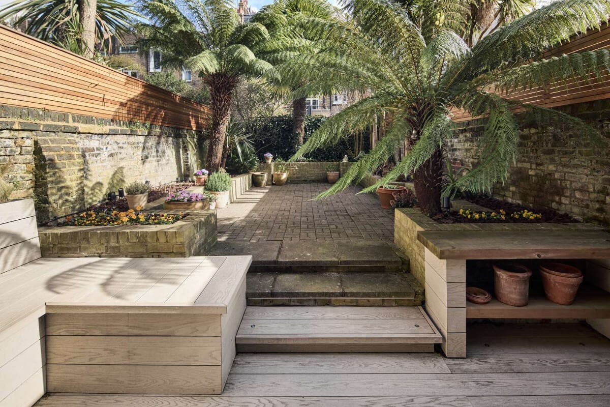 Light and Dark in a Spacious Victorian Townhouse in London 16 wooden deck garden