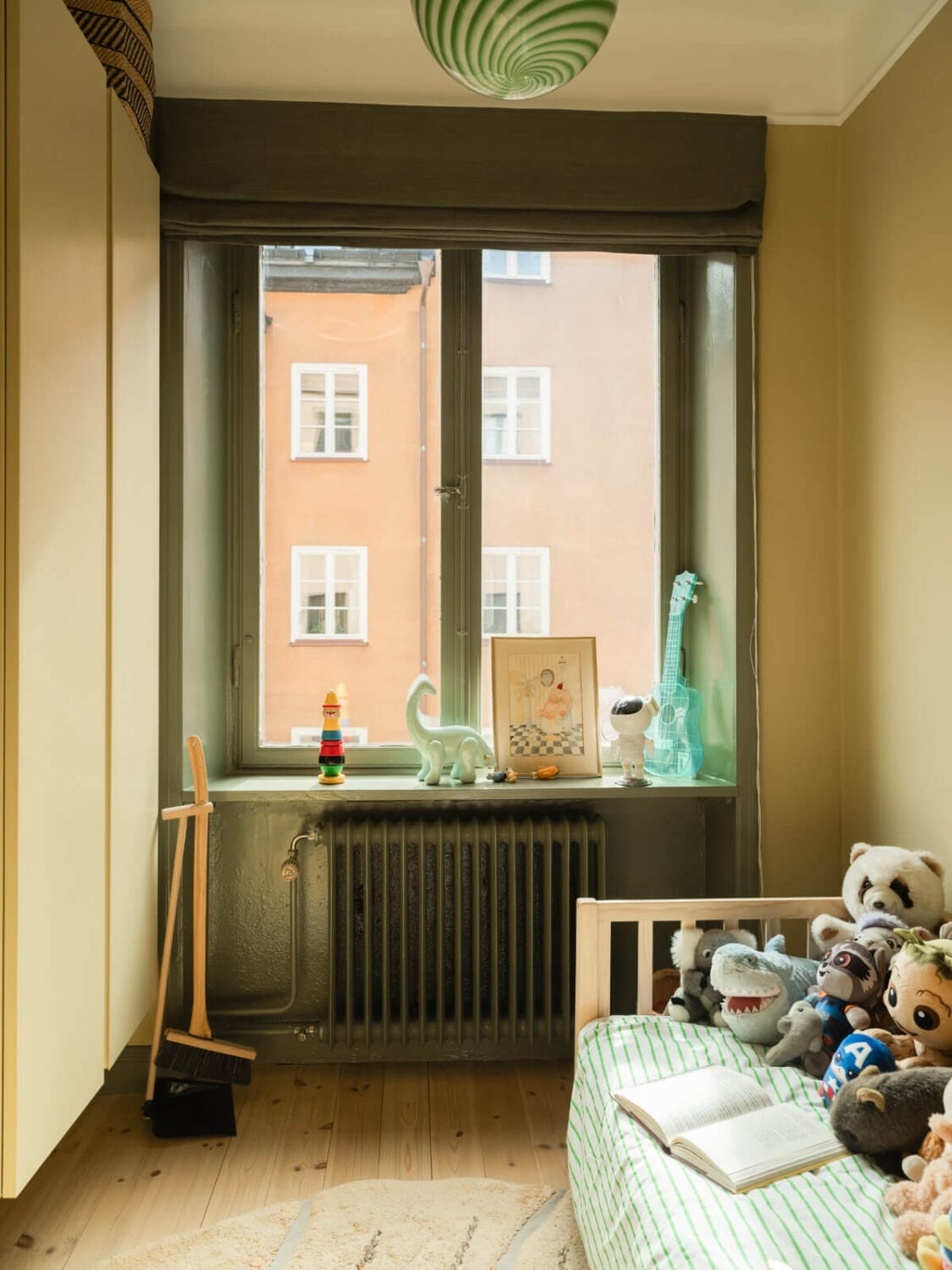 A Yellow and Green Color Palette in a Modern Swedish Apartment 12 yellow and green childrens room