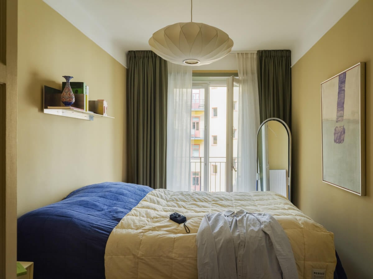 A Yellow and Green Color Palette in a Modern Swedish Apartment 15 yellow bedroom green curtains