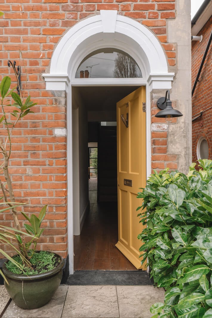 A Kitchen with Terracotta Tiles in a Renovated English Home 25 yellow front door