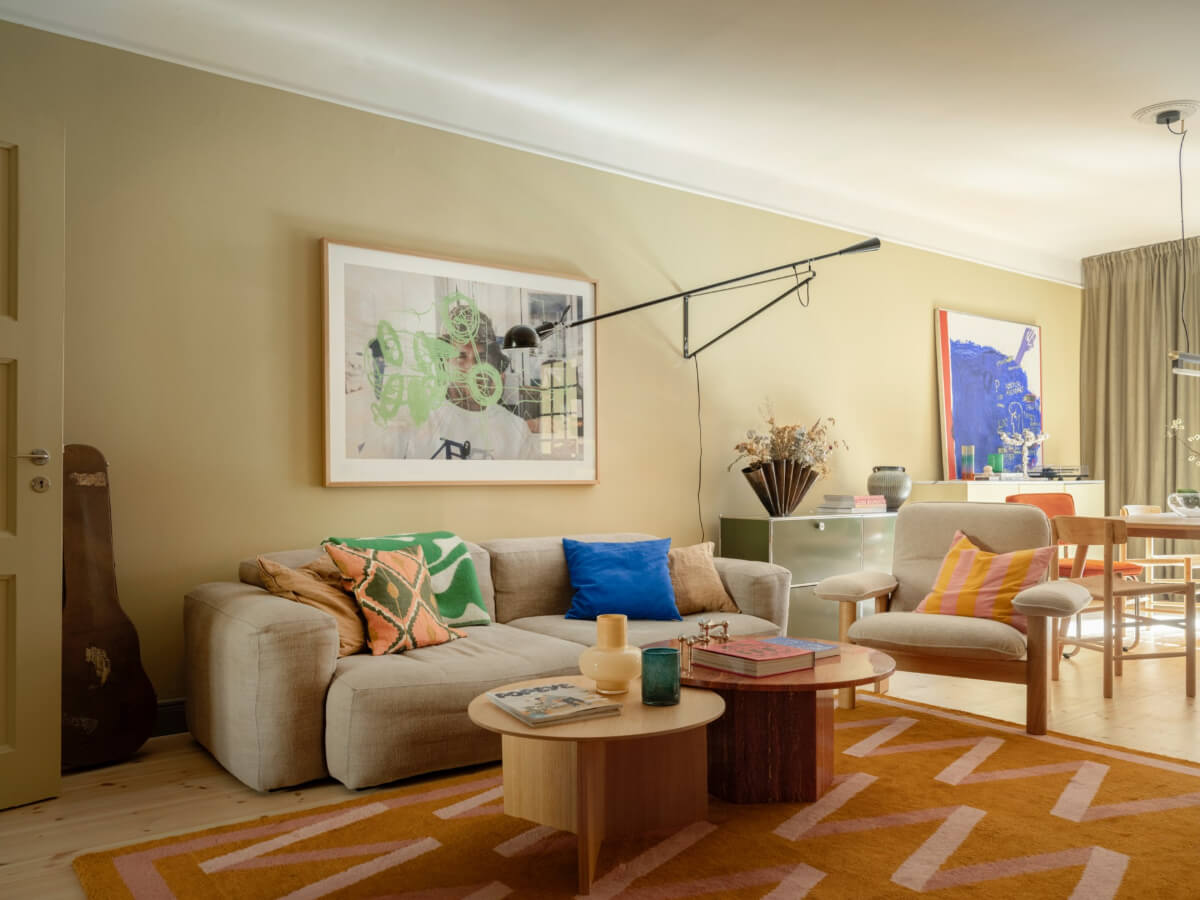 A Yellow and Green Color Palette in a Modern Swedish Apartment 1 yellow scandinavian living room
