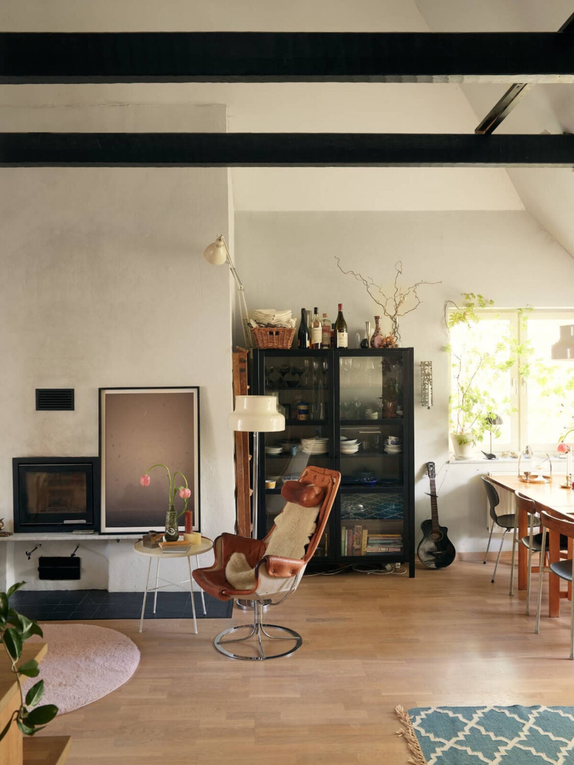 A Stunning Top-Floor Apartment with High Ceilings in a Former Church 14 attic-apartment-living-room-wooden-beams