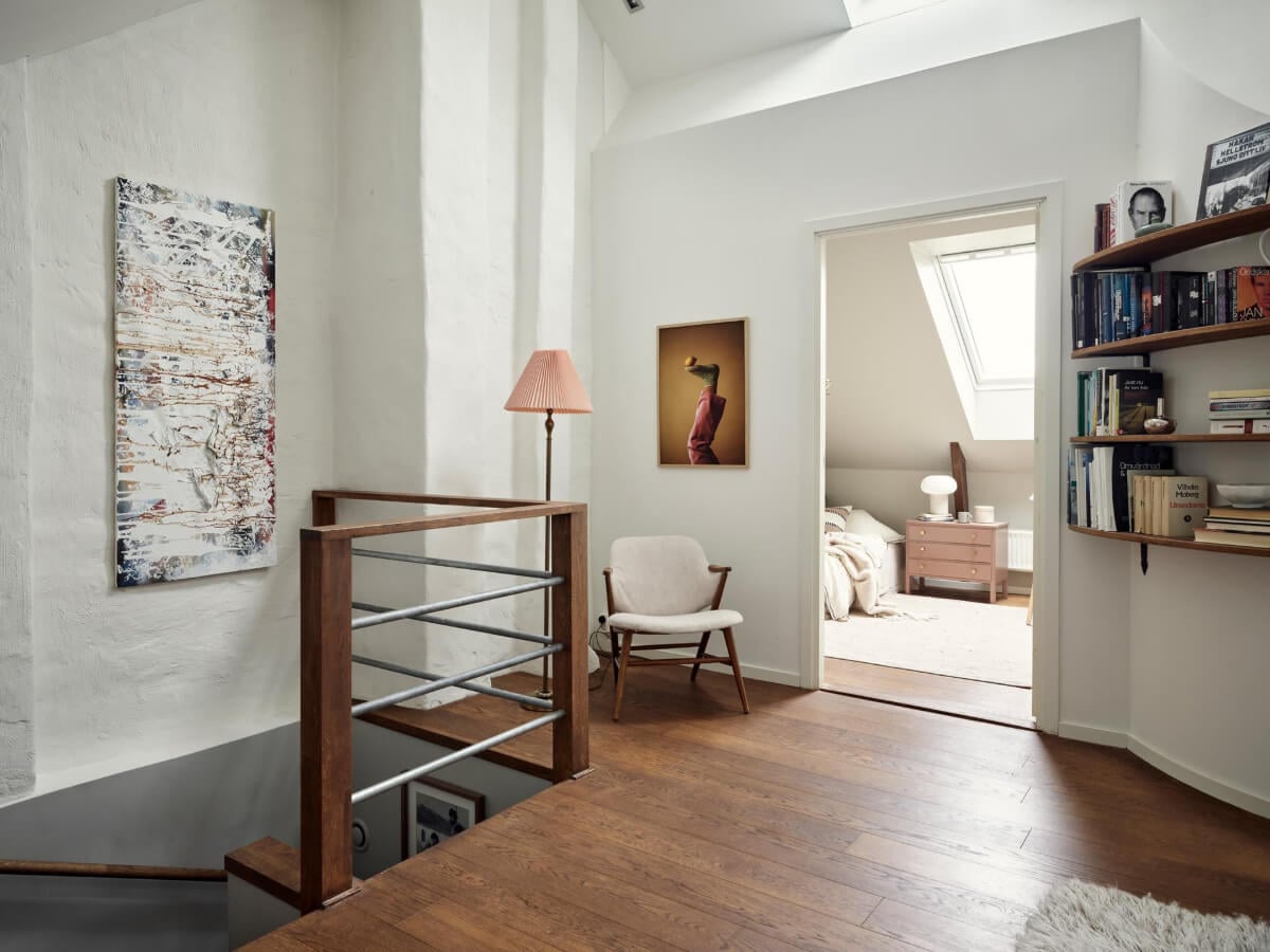 A Harmonious Color Palette in a Swedish Duplex Apartment 27 attic room rounded shelves