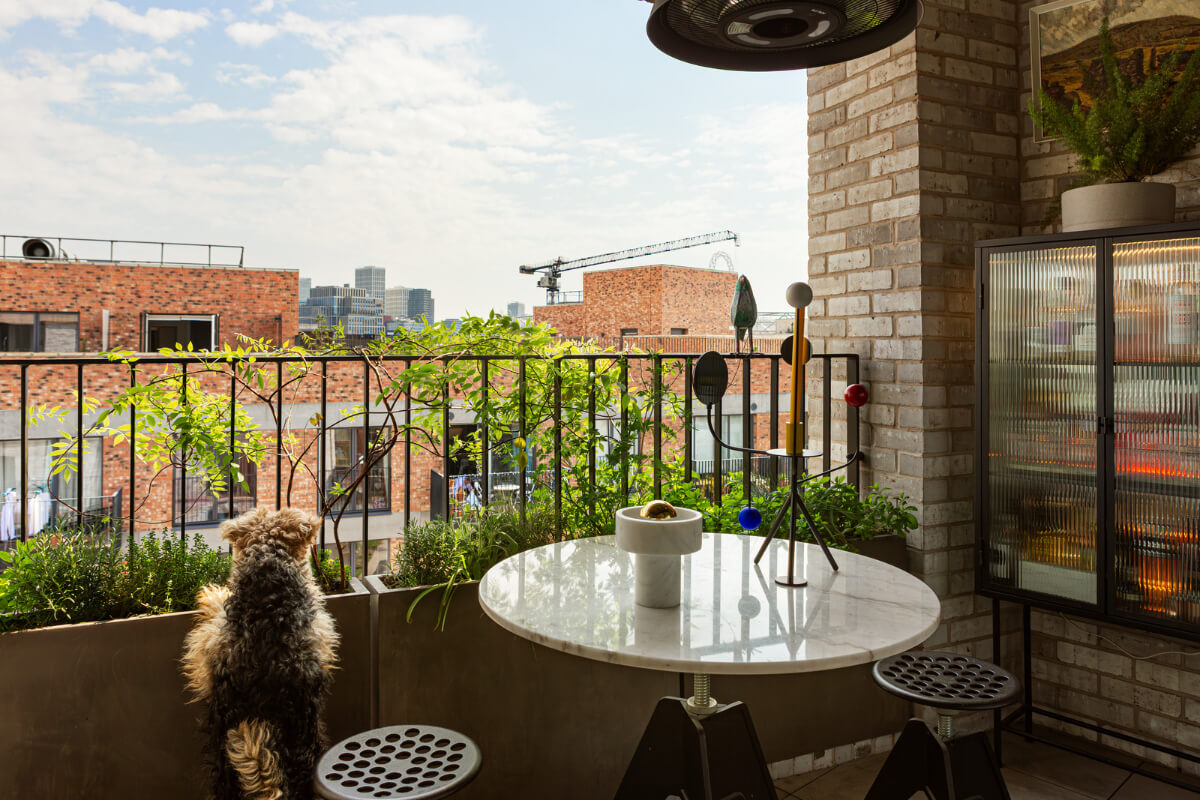 Playful Colors in a Modern One-Bedroom Apartment in London 12 balcony