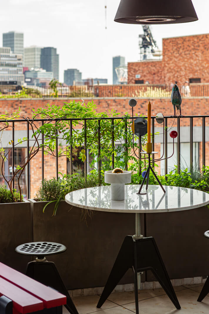 Playful Colors in a Modern One-Bedroom Apartment in London 13 balcony table