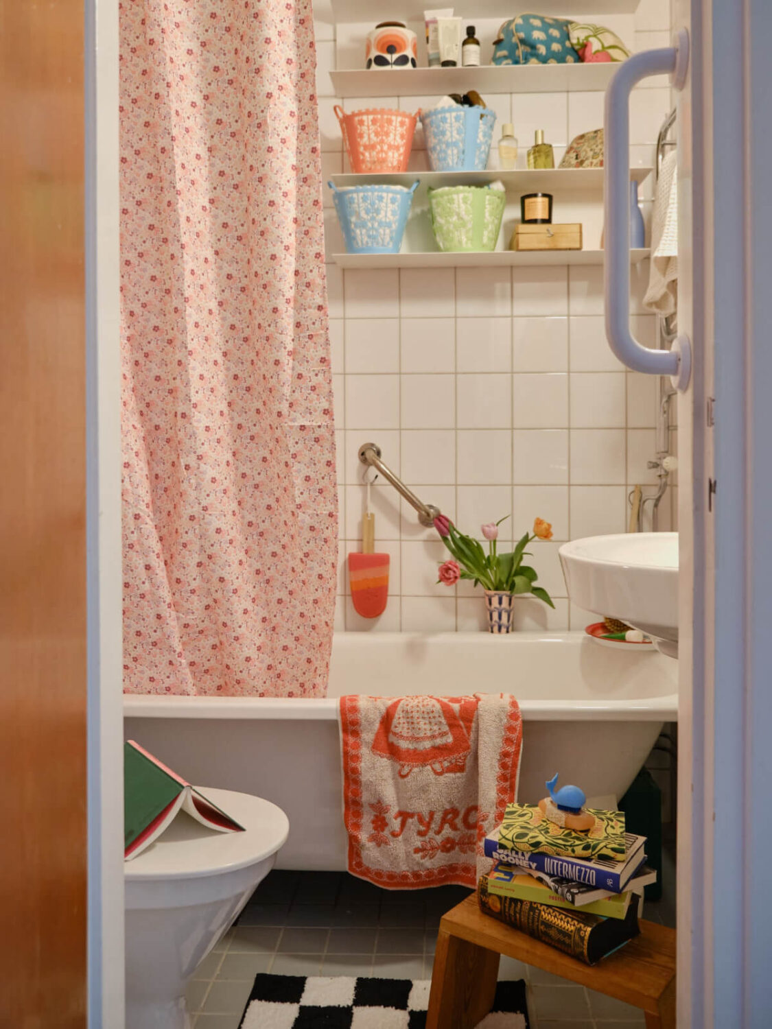 A Colorful 1940s Apartment with Original Elements 29 bathroom colorful textiles