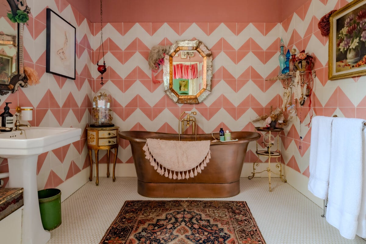 Pearl Lowe and Danny Goffey’s Eclectic Gothic Somerset Home Is For Sale 17 bathroom copper bath pink geometric tiles nordroom
