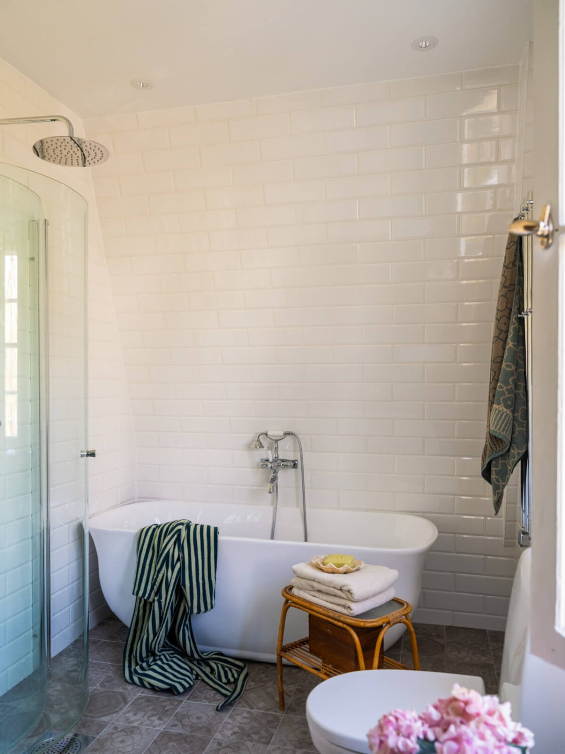 An Early 20th-Century Family Home Decorated with Color and Art 30 bathroom-freestanding-bath-white-tiles
