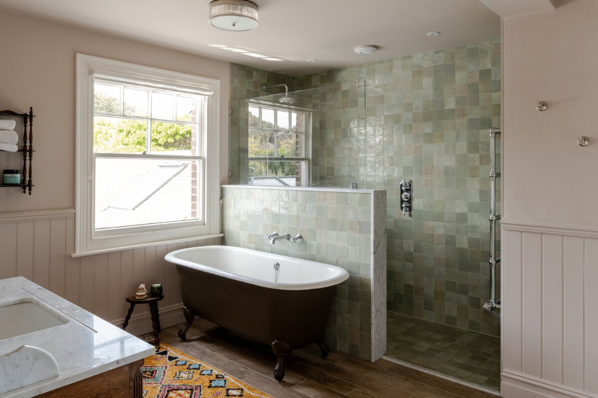A Grand Edwardian Villa with a Yellow Kitchen and Coastal Views 25 bathroom freestanding black bath walk in shower