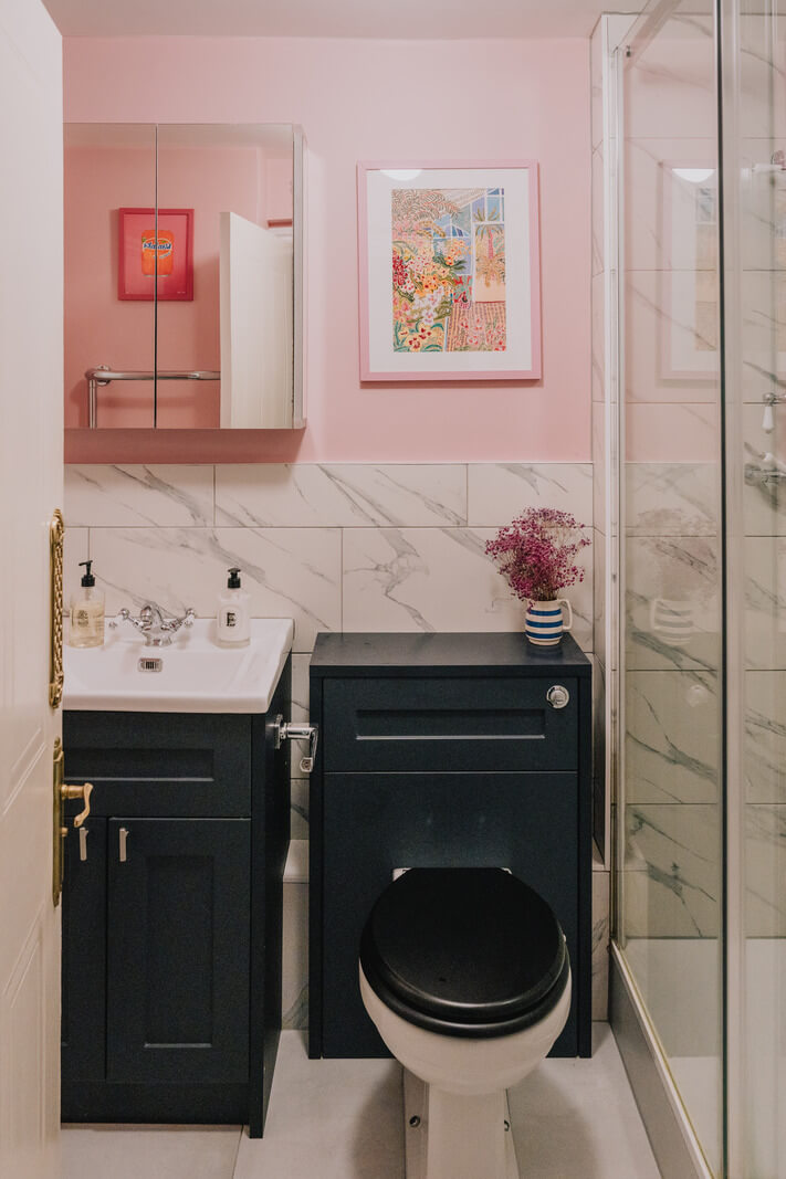 A Colorful Apartment in a Former Victorian Church in London 13 bathroom marble tiles pink walls