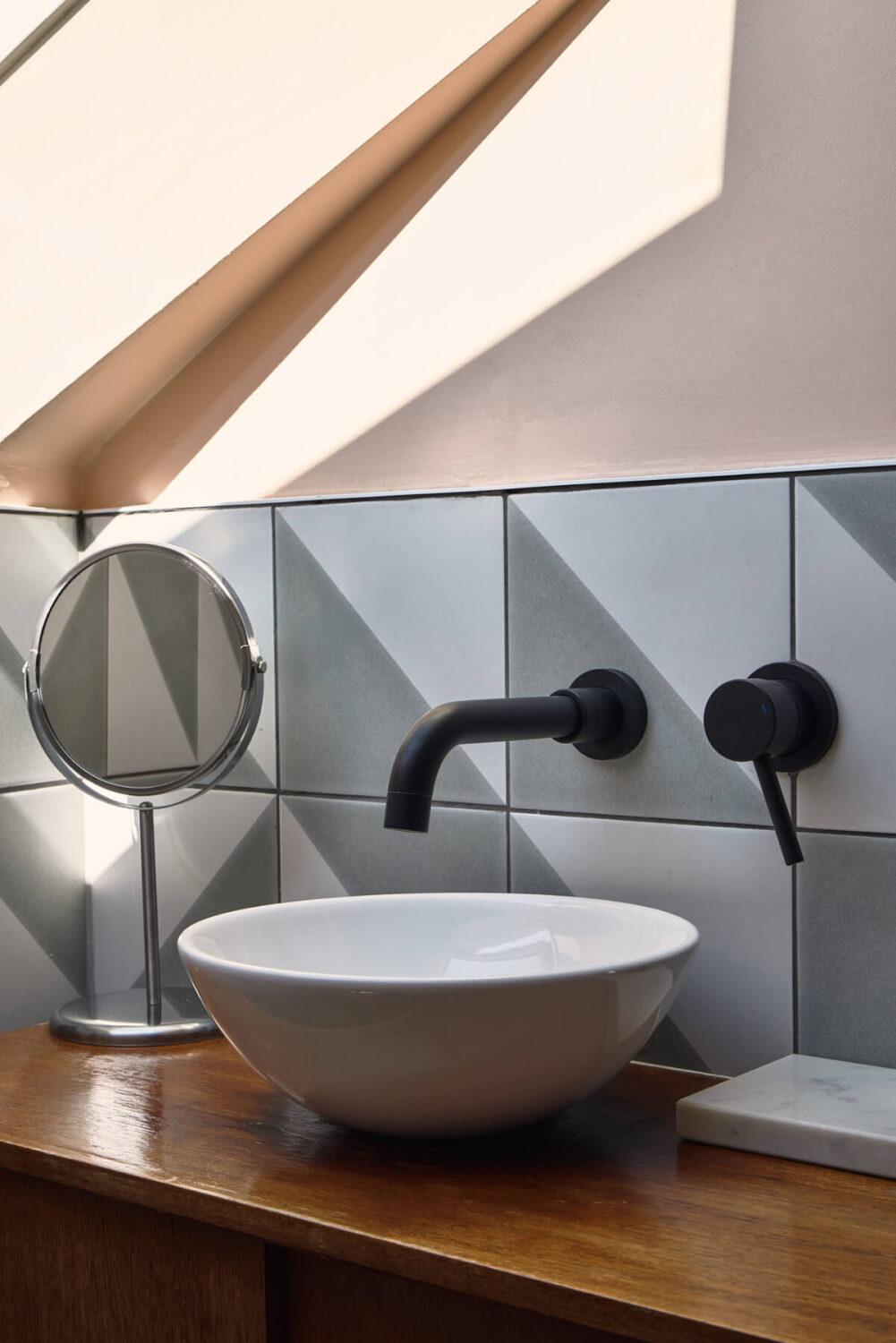 Moody Tones in a Restored and Extended Victorian Home in London 22 bathroom sink detail