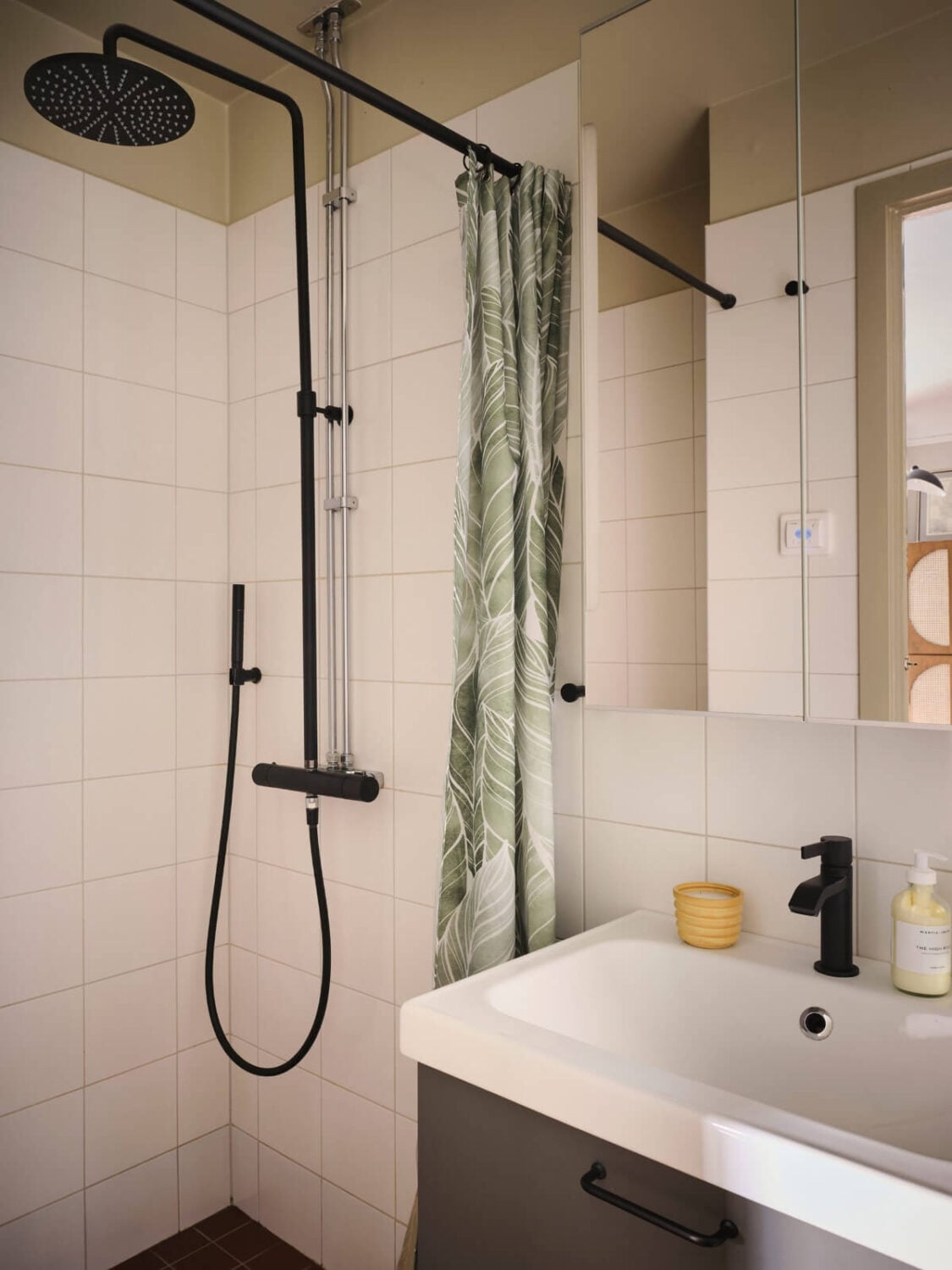 A Fantastic Small Art Nouveau Apartment in Stockholm 20 bathroom white tiles painted ceiling nordroom