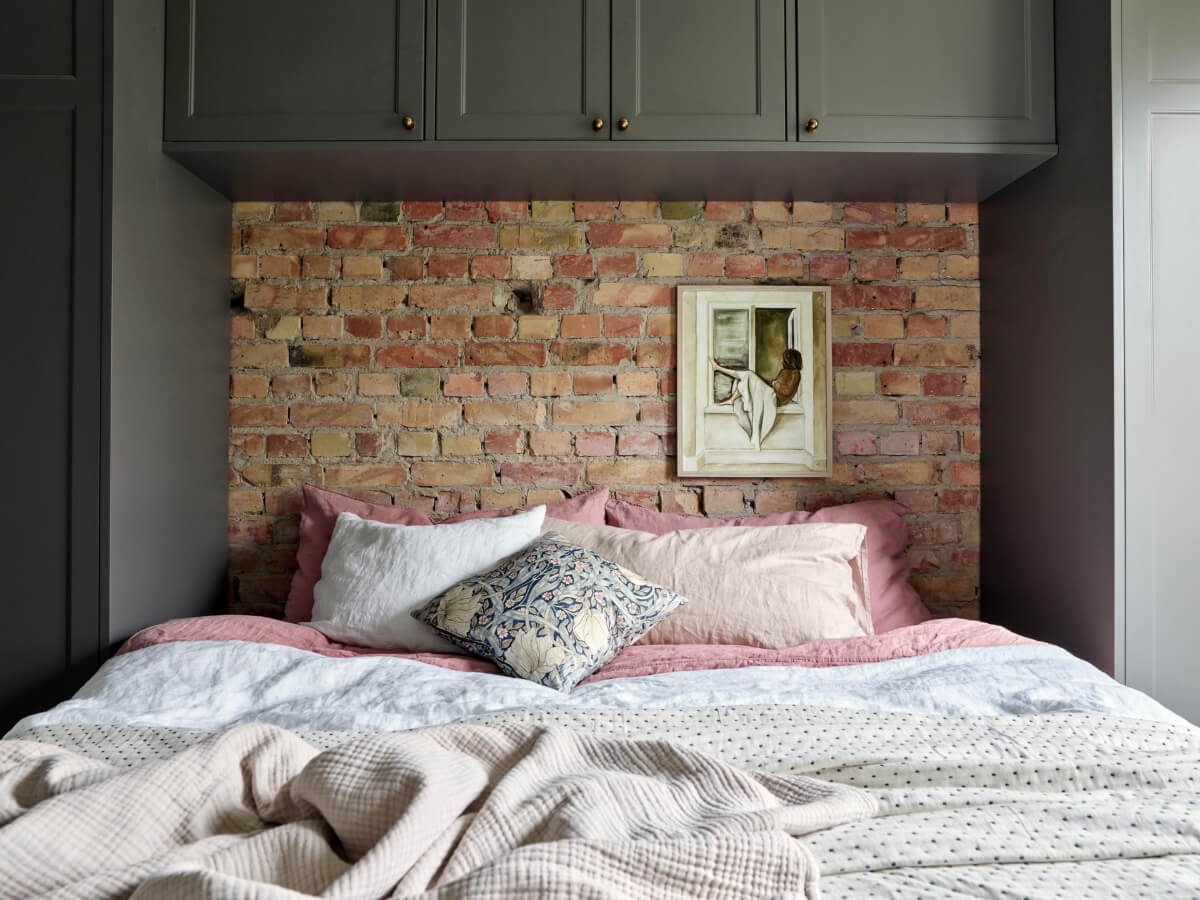 A Harmonious Color Palette in a Swedish Duplex Apartment 15 bedroom exposed brick built-in wardrobes