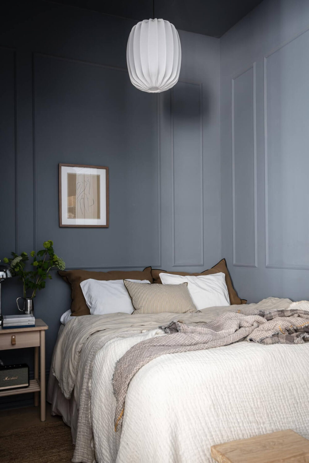A Blue Studio Apartment with Unique Stucco and Site-Built Storage 14 bedroom niche wall paneling