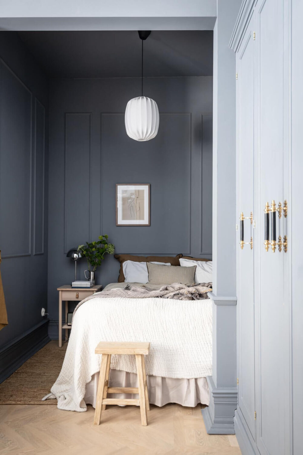 A Blue Studio Apartment with Unique Stucco and Site-Built Storage 12 bedroom niche wardrobes studio apartment