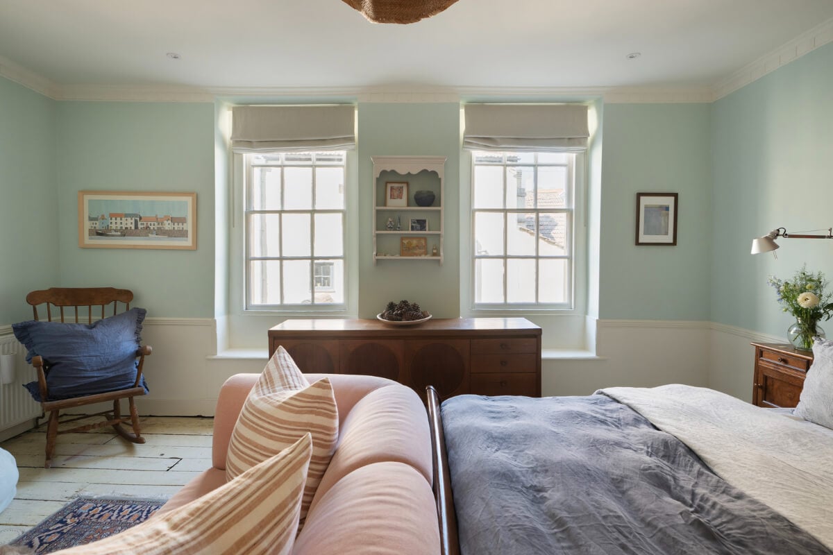 A Family Home with a Cheerful Color Palette in a Historic House 12 bedroom pale blue walls rustic timber floorboards